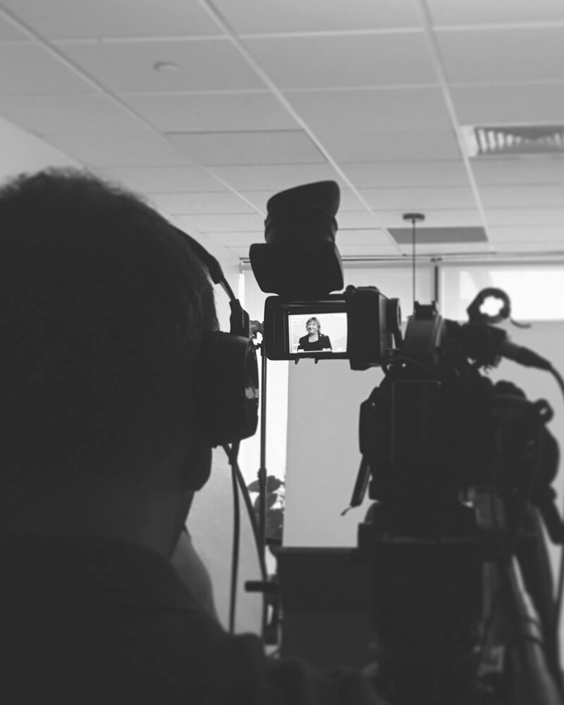 Behind-the-scenes camera filming Andrea