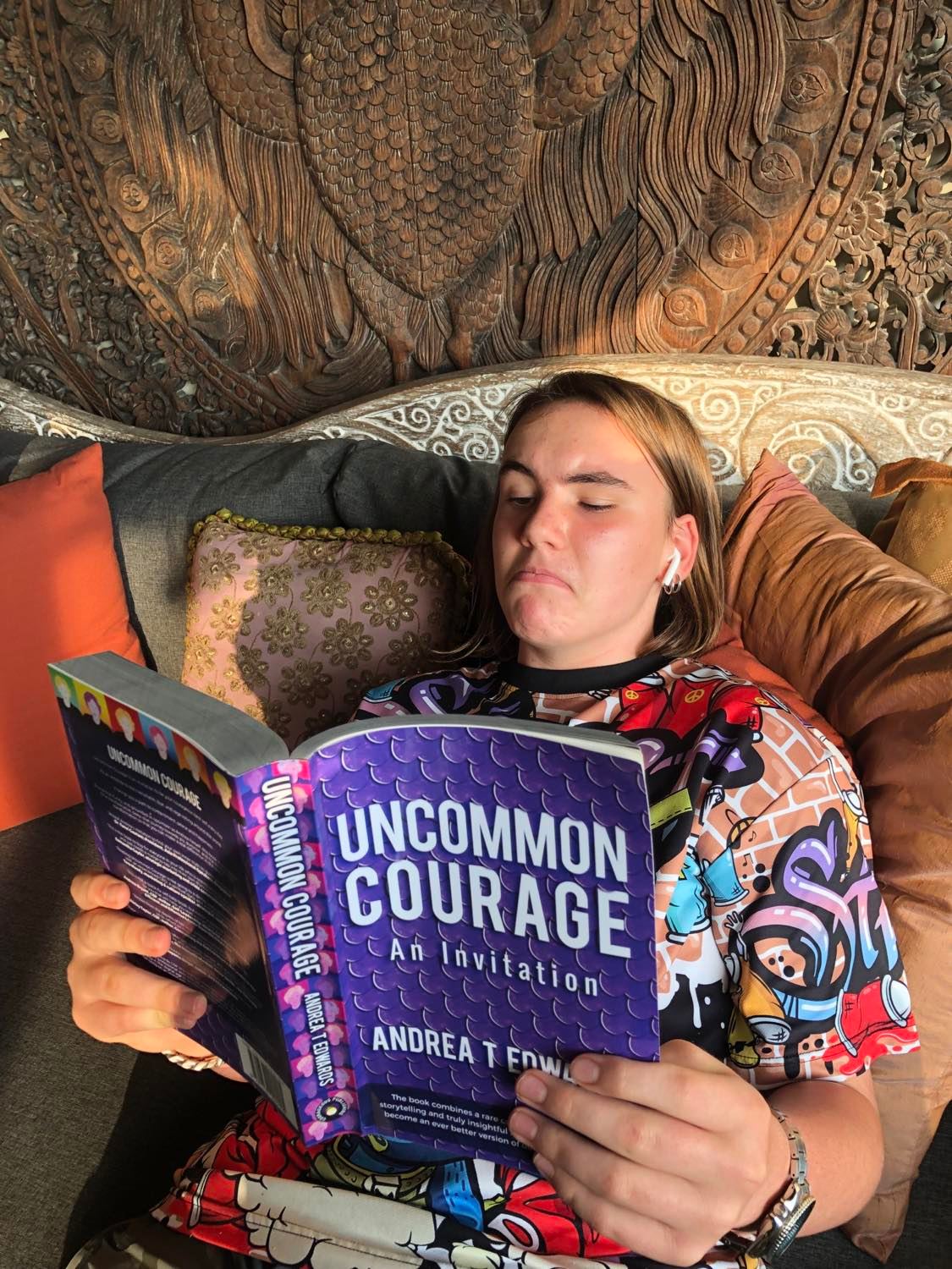 Jax reading Uncommon Courage
